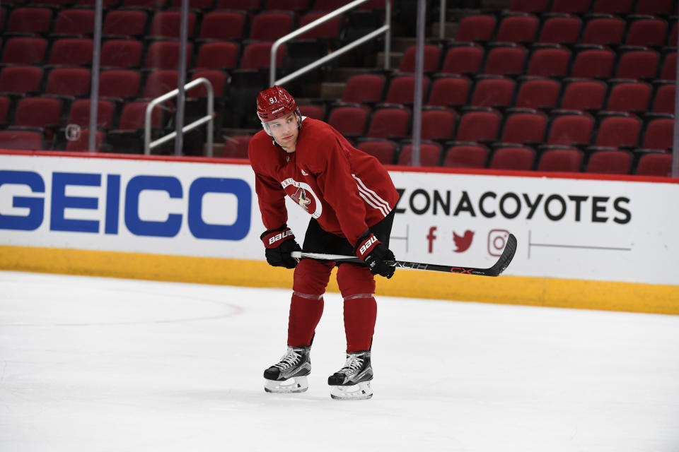 GLENDALE, ARIZONA - DECEMBER 18: Taylor Hall #91 of the Arizona Coyotes looks up ice during practice at Gila River Arena on December 18, 2019 in Glendale, Arizona. (Photo by Norm Hall/Getty Images)