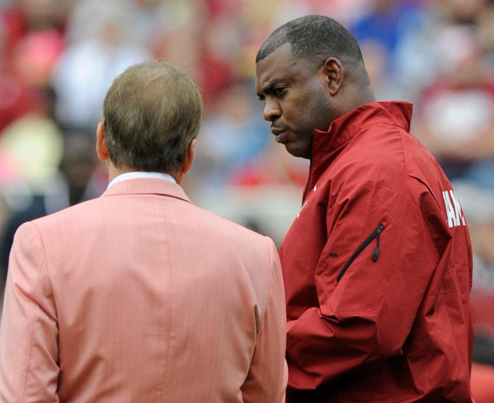 Defensive backs coach Mel Tucker chats with head coach Nick Saban before the A-Day Spring Game at Bryant-Denny Stadium in Tuscaloosa, Ala. on Saturday April 18, 2015.