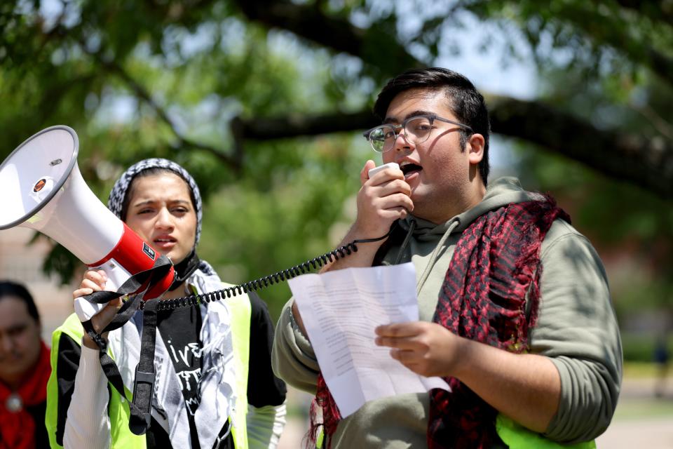 Student Abraar Hassany speaks Wednesday during a May Day rally hosted by the University of Oklahoma's Student Coalition for Palestinian Liberation and Student Socialist League on the OU campus in Norman.
