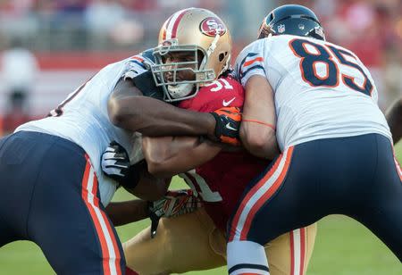 Sep 14, 2014; Santa Clara, CA, USA; San Francisco 49ers defensive end Ray McDonald (91) rushes the passer during the second quarter of the game against the Chicago Bears at Levi's Stadium. The Chicago Bears defeated the San Francisco 49ers 28-20. Mandatory Credit: Ed Szczepanski-USA TODAY Sports