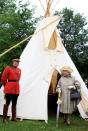 <p>Queen Elizabeth II checks out a wigwam as she visits Halifax Common on June 28. The trip to Canada was to celebrate the centenary of the Canadian Navy as well as celebrate Canada Day.</p>