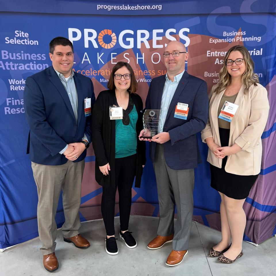 Nicolet National Bank collects its Economic Accelerator of the Year Award at the 12th annual Progress Lakeshore Excellence in Economic Development Awards May 9.