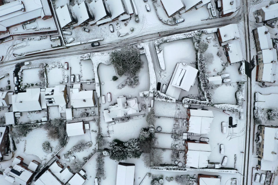 Snow covered houses in the village of Oulton in Staffordshire.