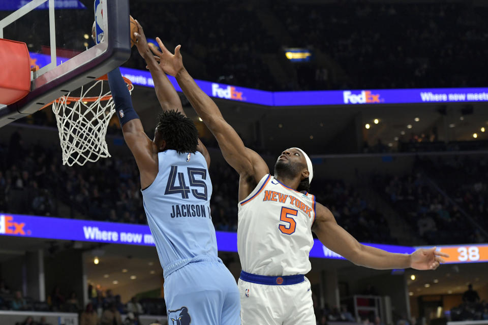 Memphis Grizzlies forward GG Jackson (45) shoots against New York Knicks forward Precious Achiuwa (5) during the first half of an NBA basketball game Saturday, Jan. 13, 2024, in Memphis, Tenn. (AP Photo/Brandon Dill)