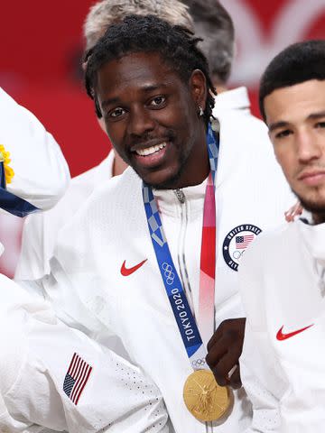 Stephen Gosling/NBAE/Getty Jrue Holiday of the USA Men's National Team poses for a photo after winning the Gold Medal at the 2020 Tokyo Olympics.