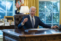 President Joe Biden speaks before signing an executive order to improve government services, in the Oval Office of the White House, Monday, Dec. 13, 2021, in Washington. (AP Photo/Evan Vucci)