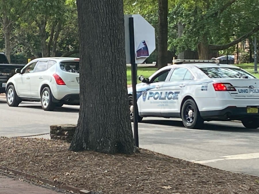 UNC police cars line the streets outside of the Student Union on campus. (Terrence Evans/CBS 17)