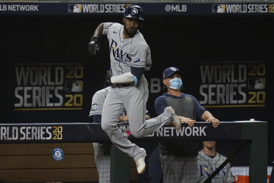 Tampa Bay Rays' Randy Arozarena celebrates a home run during the first inning in Game 6 of the baseball World Series against the Los Angeles Dodgers Tuesday, Oct. 27, 2020, in Arlington, Texas. (AP Photo/Eric Gay)