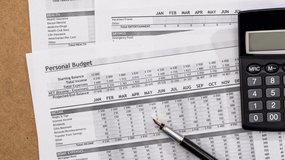 Personal Budget with pen and calculator.