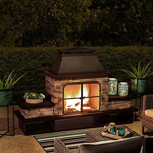 <p><strong>Sunjoy</strong></p><p>amazon.com</p><p><strong>$2375.74</strong></p><p>At more than 6 feet wide, this ready-to-assemble wood-burning fireplace boasts a sleek topper for a more luxury look. The shelves underneath provide a handy spot for storing wood.</p>