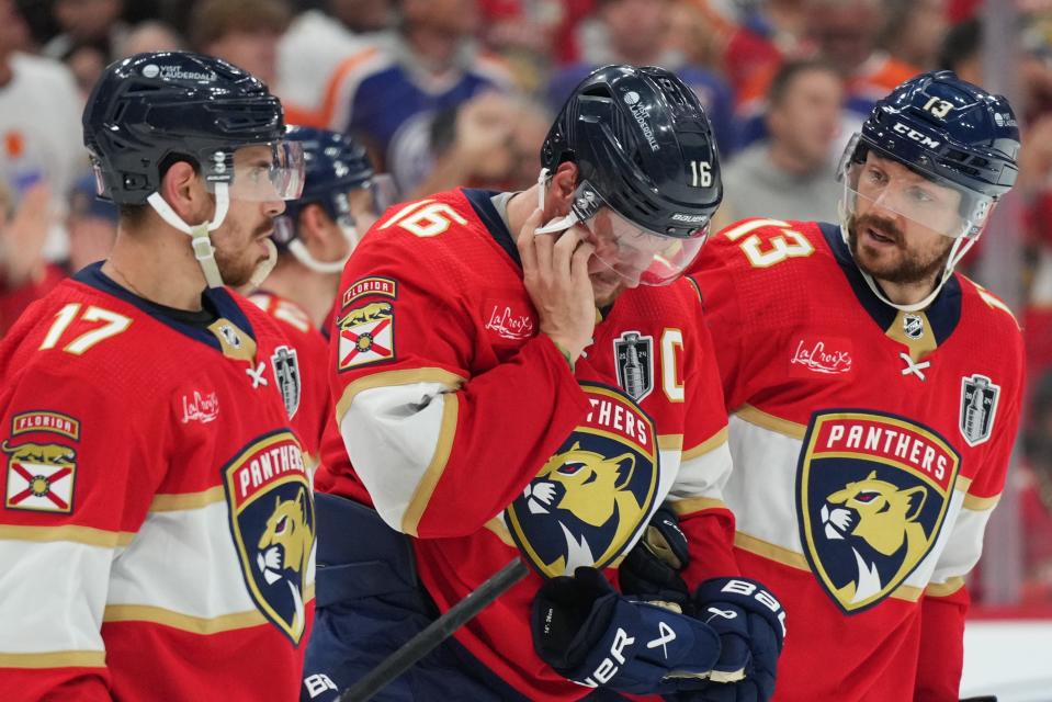 Jun 10, 2024; Sunrise, Florida, USA; Florida Panthers forward Aleksander Barkov (16) leaves the ice holding his jaw during the third period against the Edmonton Oilers in game two of the 2024 Stanley Cup Final at Amerant Bank Arena. Mandatory Credit: Jim Rassol-USA TODAY Sports