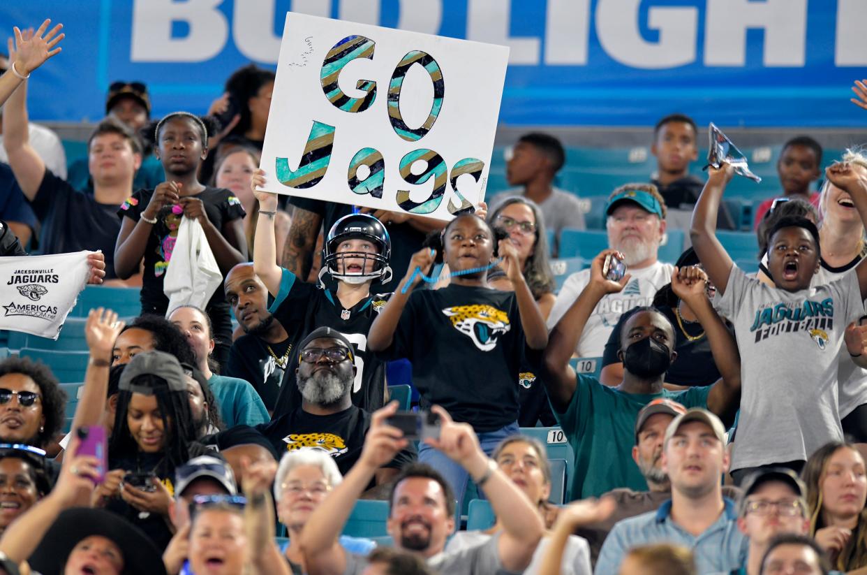 Jaguars fans cheer on their team at TIAA Bank Field during the fourth quarter of the 24-13 preseason loss to the Cleveland Browns.