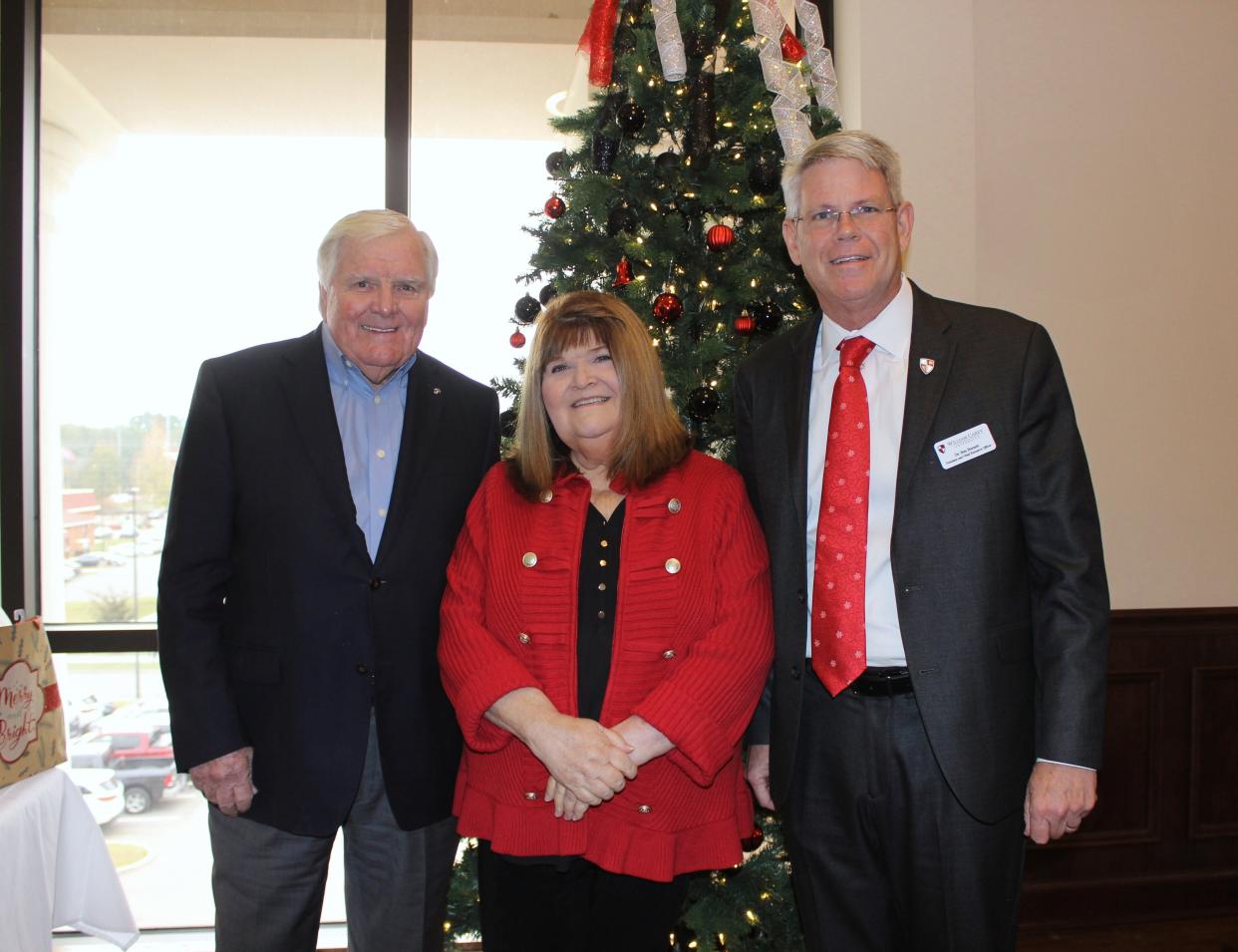 The Asbury Foundation has awarded a $7 million grant to the William Carey University College of Health Sciences. Pictured from left are William Ray, president and CEO of the Asbury Foundation; Janet Williams, WCU vice president of health sciences; and WCU President Ben Burnett.