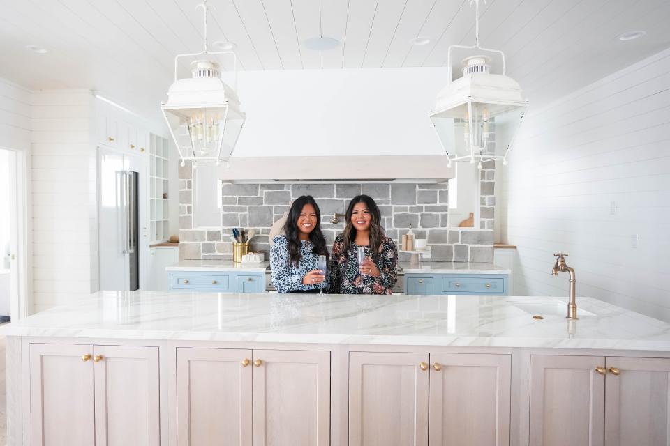 Niña Williams, left, and Cecilia Moyer pose for a photo in Niña’s home in Waukee.