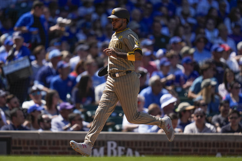 San Diego Padres designated hitter Luis Arraez, runs the bases to score on a double from Jake Cronenworth during the fifth inning of a baseball game Wednesday, May 8, 2024, in Chicago. (AP Photo/Erin Hooley)