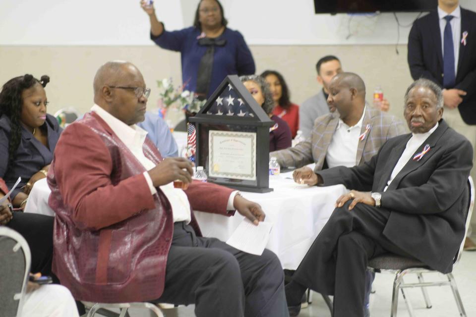 World War II Veteran Edward Owens sits with an award for his military service at the Veterans Honor Banquet Nov. 12at the United Citizen's Forum in North Amarillo.