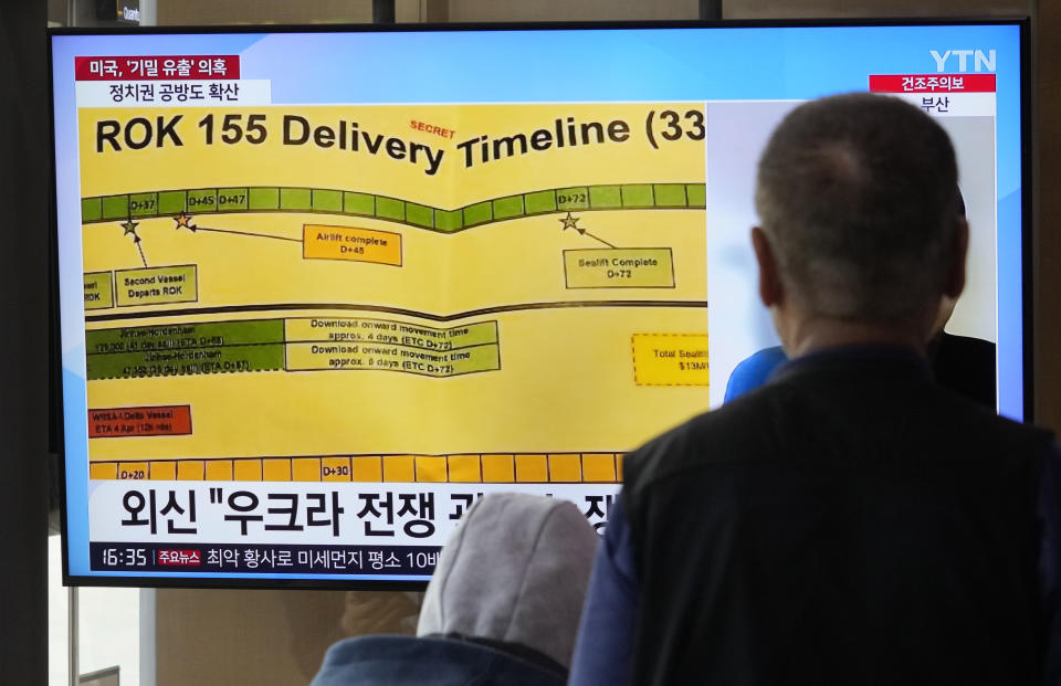 A TV screen shows a news program reporting on the leaked Pentagon documents at the Seoul Railway Station in Seoul, South Korea, Wednesday, April 12, 2023. (AP Photo/Ahn Young-joon)