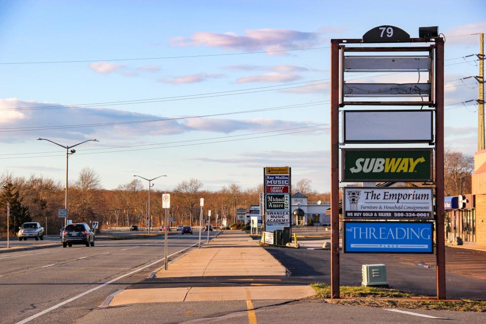 Cars drive down Swansea Mall Drive on Sunday, March 17, 2024.