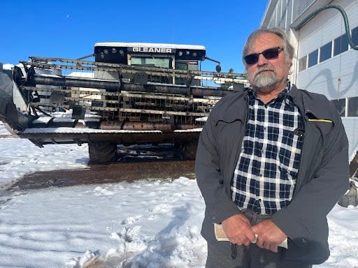 Farmer David Mol says a broken-down combine has added to his harvesting hardships this fall. 