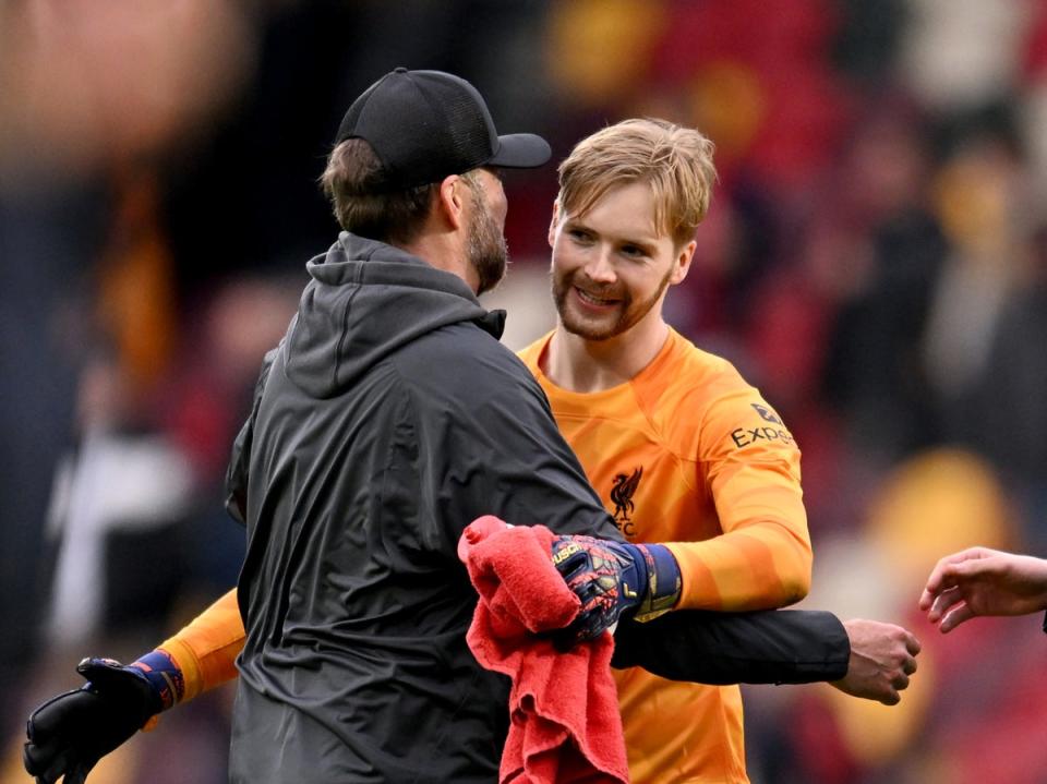 Jurgen Klopp embraces his stand-in goalkeeper (Getty)