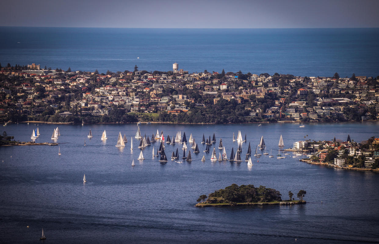 SYDNEY, AUSTRALIA - JULY 19: Sailing boats race on Sydney Harbour, New South Wales, on July 19, 2020 in Australia.    (Photo by David Gray/Getty Images)