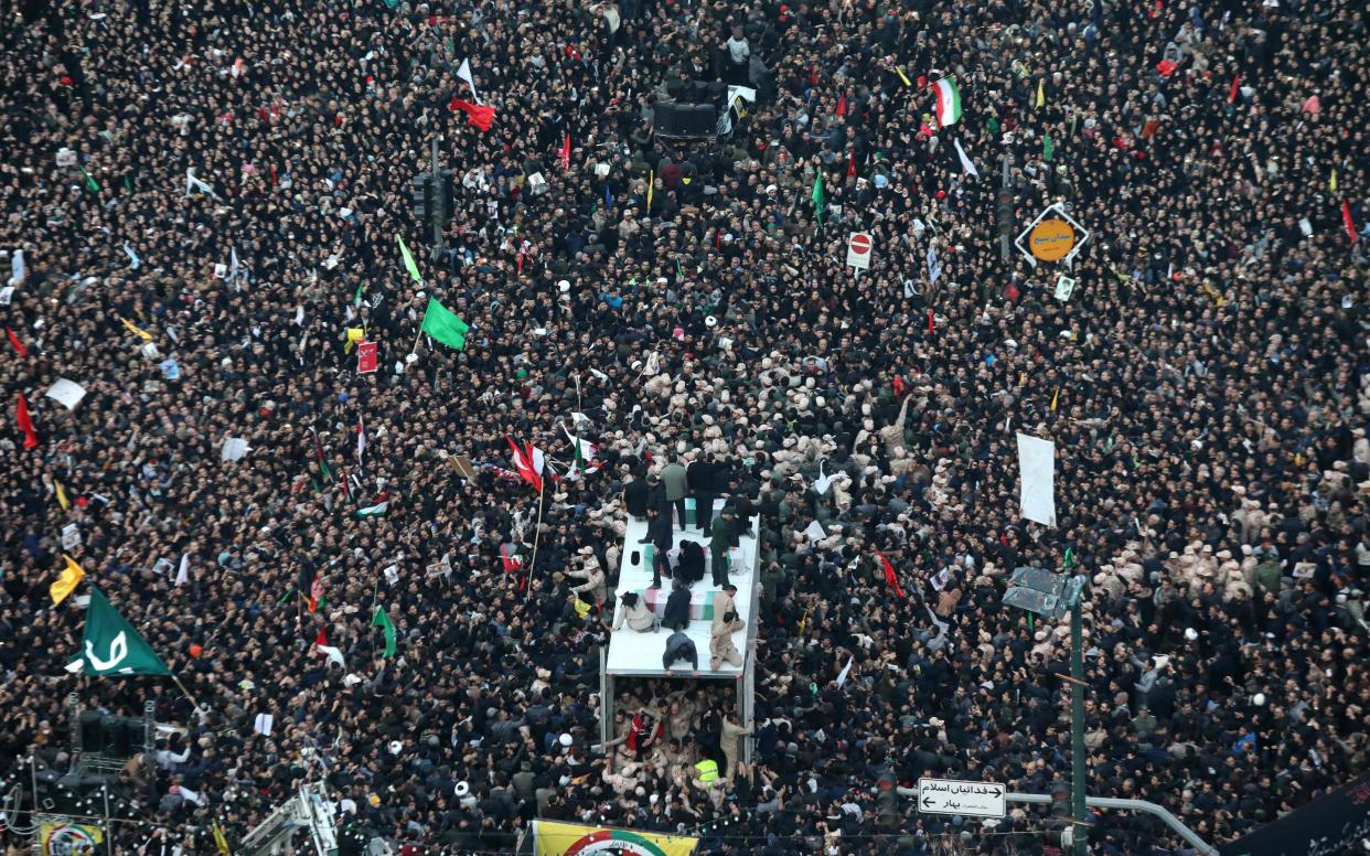 Iranians pay homage to General Qassim Soleimani - MOHAMMAD TAGHI/AFP  