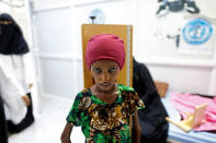 Saida Ahmad Baghili, 18, who has been affected by severe malnutrition, stands on a height measuring scale at the al-Thawra hospital in the Red Sea port city of Hodeidah, Yemen November 17, 2016. REUTERS/Khaled Abdullah