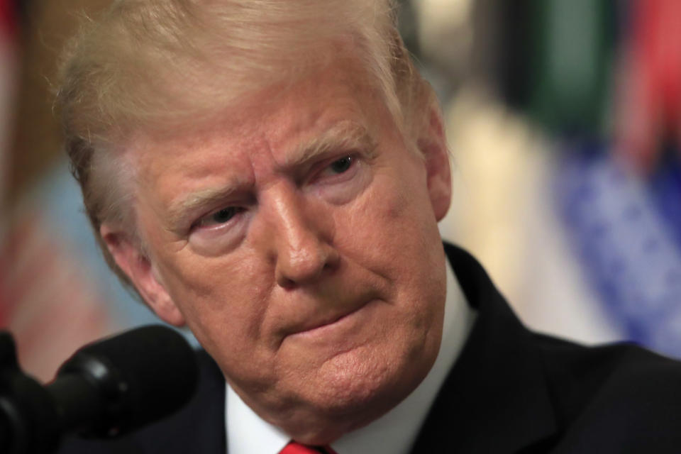 President Donald Trump speaks in the Diplomatic Room of the White House, Sunday, Oct. 27, 2019 in Washington. Trump says Islamic State group leader Abu Bakr al-Baghdadi died after running into a dead-end tunnel and igniting an explosive vest, killing himself and three of his young children, (AP Photo/Manuel Balce Ceneta)