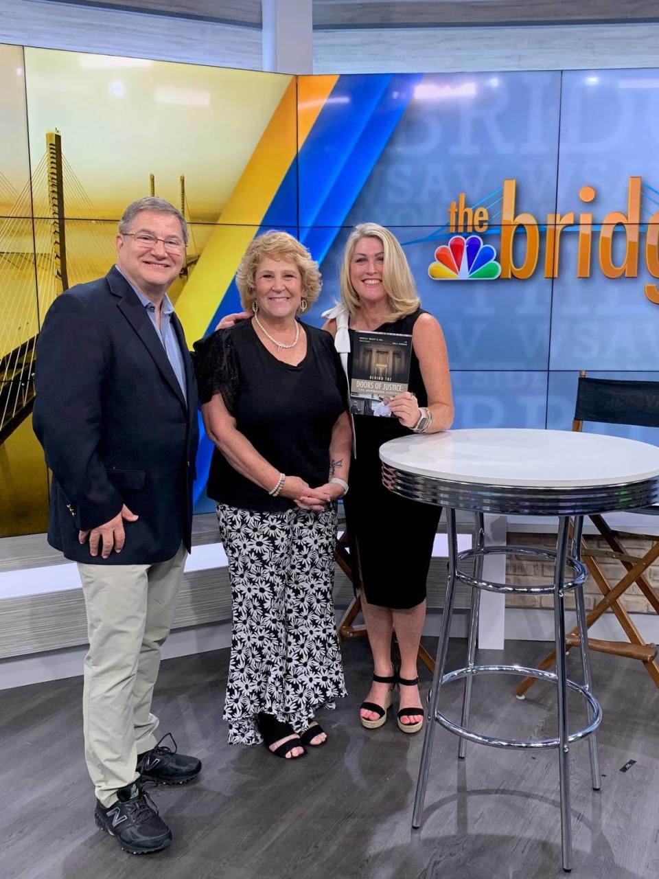 Becky Hill and her co-author Neil Gordon promoting their book Behind the Doors of Justice at the WSAV TV station in Savannah.