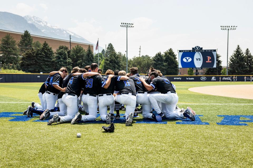BYU players take a knee prior to game against Pepperdine during final homestand of the 2023 season. The Cougars open their 2024 campaign Friday against USC in Arizona. | Donovan Kelly, BYU Photo