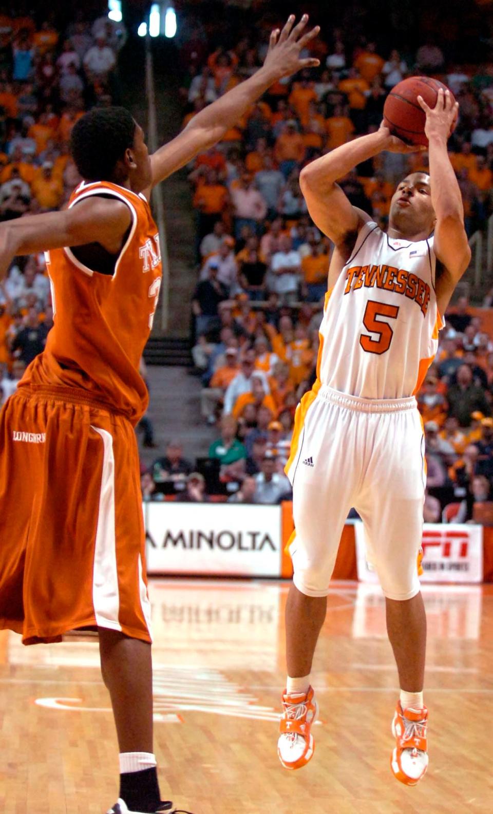 UT's Chris Lofton shoots for three in overtime as Texas defender Kevin Durant tries to block his view Dec. 23, 2006. Lofton scored a career high 35 points to lead the Volunteers.