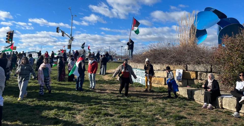 Around 250 students wave Palestinian flags and chant, “ceasefire now” at a peaceful rally in Overland Park, Saturday afternoon.