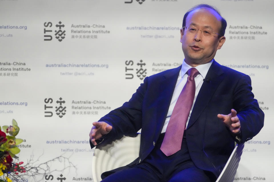 China's Ambassador to Australia, Xiao Qian gestures as he answers following his address on the state of relations between Australia and China at the University of Technology in Sydney, Australia, Friday, June 24, 2022.(AP Photo/Mark Baker)