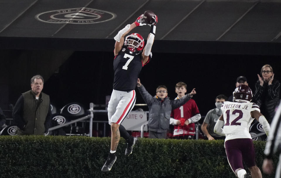 Georgia wide receiver Jermaine Burton makes a touchdown reception against Mississippi State during the first half of an NCAA college football game Saturday, Nov. 21, 2020, in Athens, Ga. (AP Photo/Brynn Anderson)