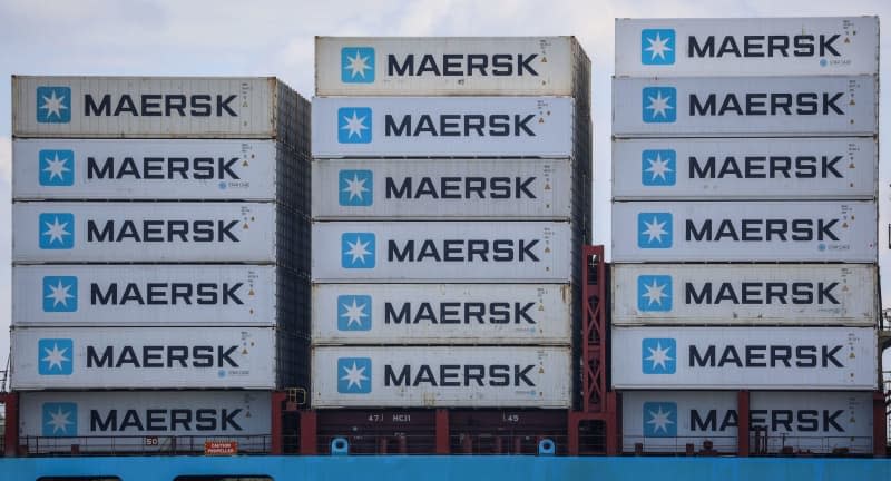 Containers from the Maersk shipping company are on board a freighter on the Elbe. The Elbe is Germany's busiest river for ocean-going vessels.  Danish logistics firm AP Moller-Maersk A/S  reported on 08 February that it had swung to a loss in its fourth quarter due to weak revenues. Focke Strangmann/dpa