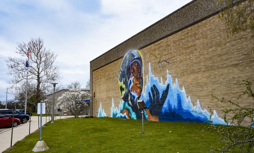 A mural by artist Max Sansing at the Lansing Public Media Center on Washington Avenue in Lansing.