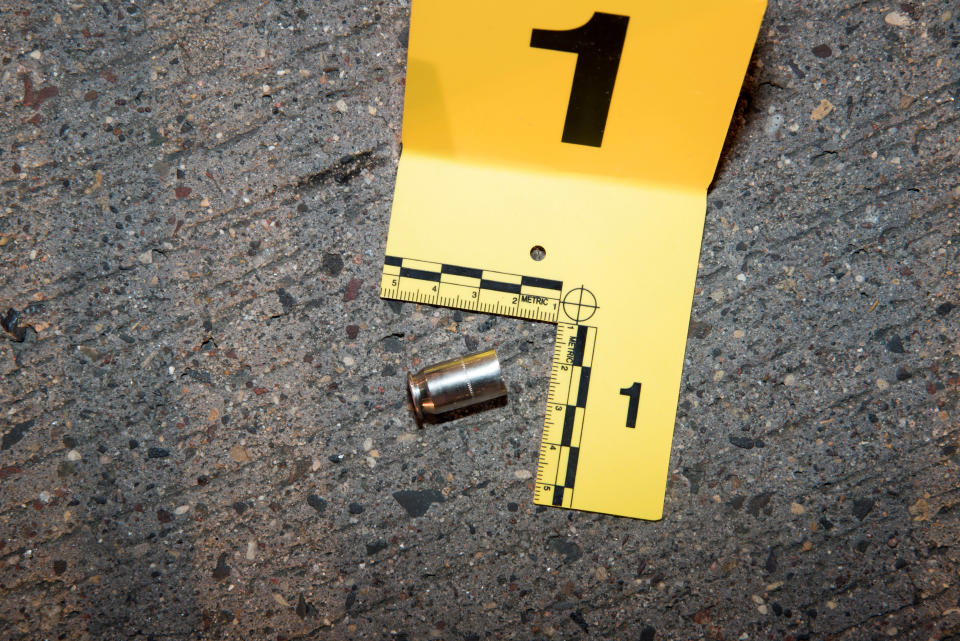 A shell casing from a bullet fired at Philando Castile lies outside his car.&nbsp;