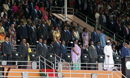 Rwanda's President-elect Paul Kagame (C) is flanked by other African leaders and his wife Jeannette during his swearing-in ceremony at Amahoro stadium in Kigali, Rwanda, August 18, 2017. REUTERS/Jean Bizimana