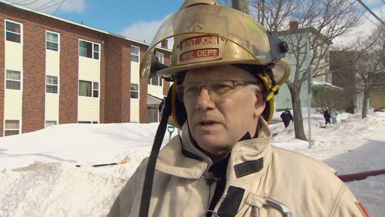 Saint John fire crews have to dig out hydrant at apartment building fire