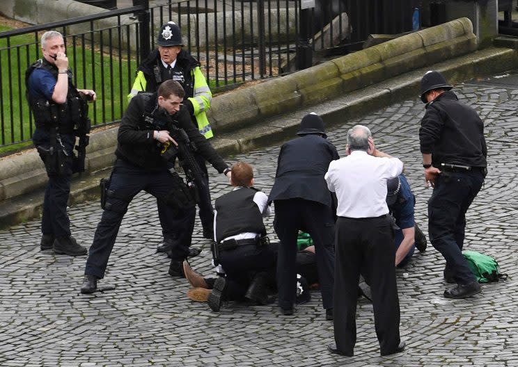 Police are treating a gun and knife incident at Britain’s Parliament “as a terrorist incident until we know otherwise. (Stefan Rousseau/PA via AP)