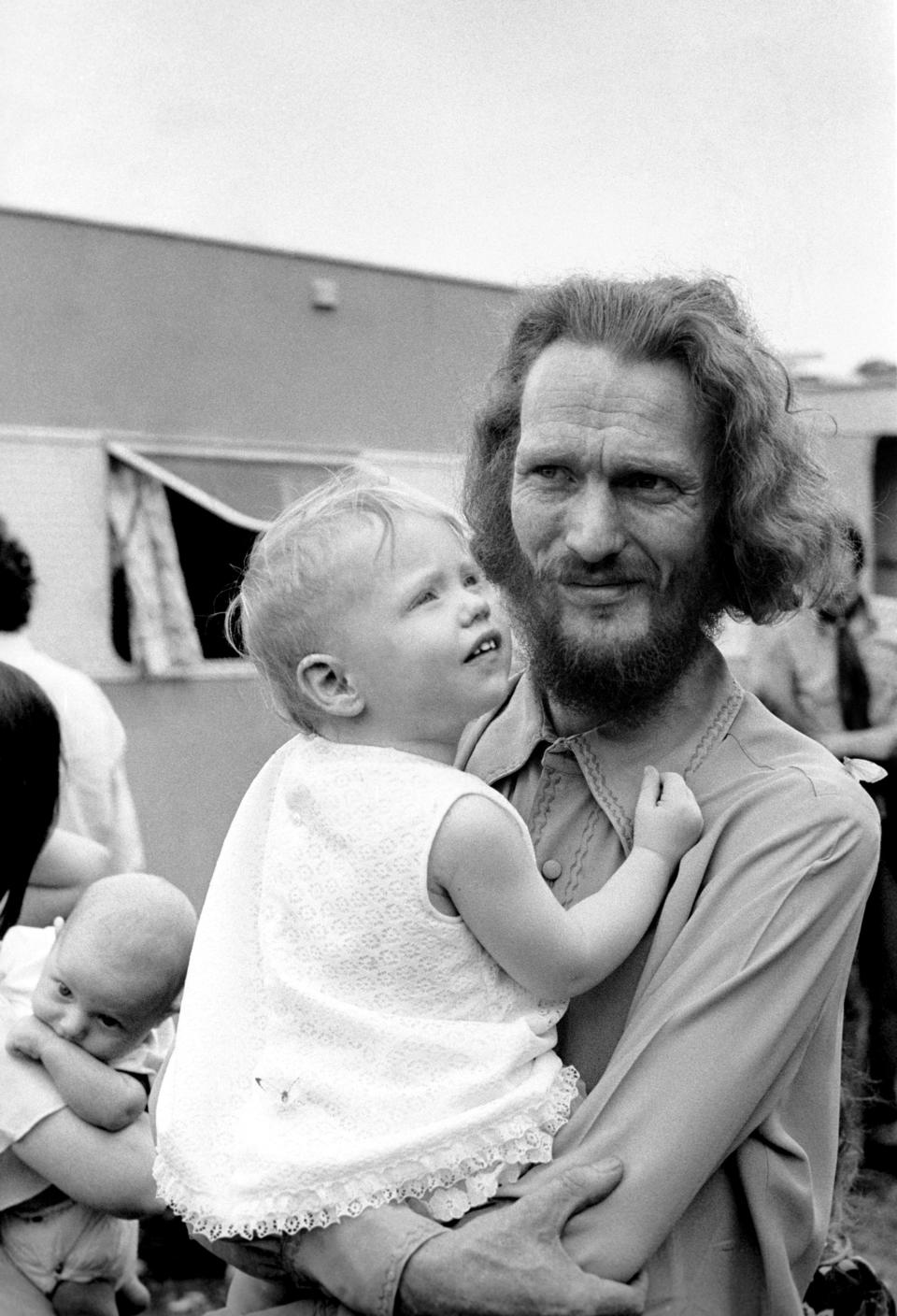 Ginger Baker, drummer for the band Cream at a Rolling Stones concert.