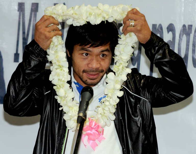 A Philippine media union demanded Thursday that Manny Pacquiao punish two members of his camp after they allegedly assaulted a photographer moments after his brutal knockout in Las Vegas