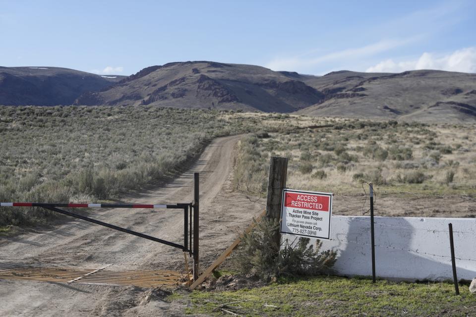 A sign displays "Access Restricted" at the Lithium Nevada Corp. mine site at Thacker Pass on April 24, 2023, near Orovada, Nev. The huge lithium mine under construction is at the center of a dispute over President Joe Biden's clean energy agenda. (AP Photo/Rick Bowmer)