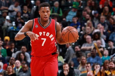 Toronto Raptors guard Kyle Lowry (7) brings the ball up court against the Indiana Pacers at Bankers Life Fieldhouse. Toronto defeats Indiana 101-94 in overtime. Mandatory Credit: Brian Spurlock-USA TODAY Sports