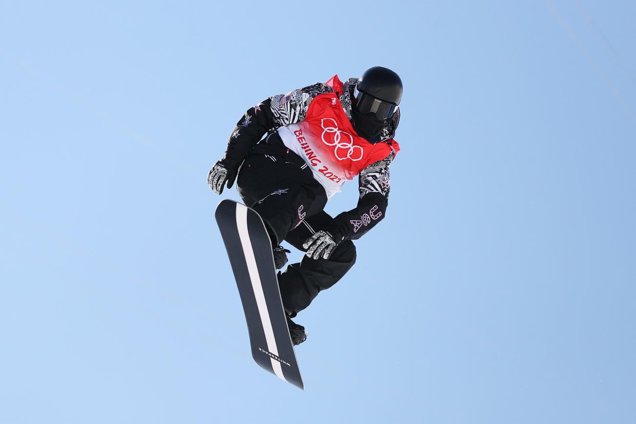 Shaun White on his snowboard in the air at the Beijing Olympics 2022