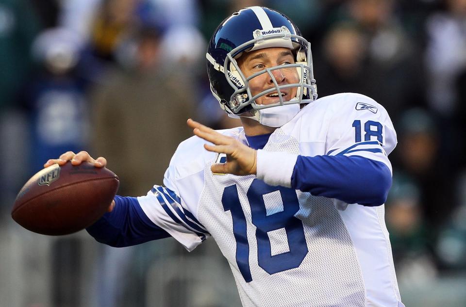 PHILADELPHIA - FILE: Peyton Manning #18 of the Indianapolis Colts throws a pass against the Philadelphia Eagles on November 7, 2010 at Lincoln Financial Field in Philadelphia, Pennsylvania. It was reported that Peyton Manning will sign as quarterback with the Denver Broncos, barring a snag during intensified contract negotiations according to sources March 19, 2012. (Photo by Jim McIsaac/Getty Images)