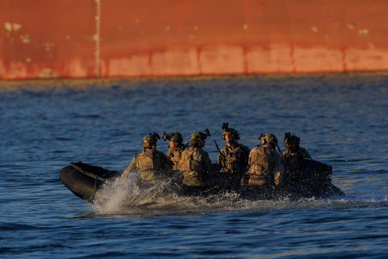 FILE PHOTO: U.S. military personnel train on the waters near Coronado, California