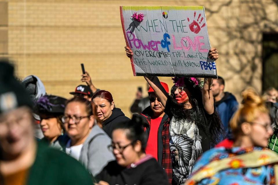 Christopher Pina, of Rapid City, joined hundres of thers during a march down Main Street on Wednesday afternoon that started at Memorial Park and ended at the federal courthouse on ninth street.