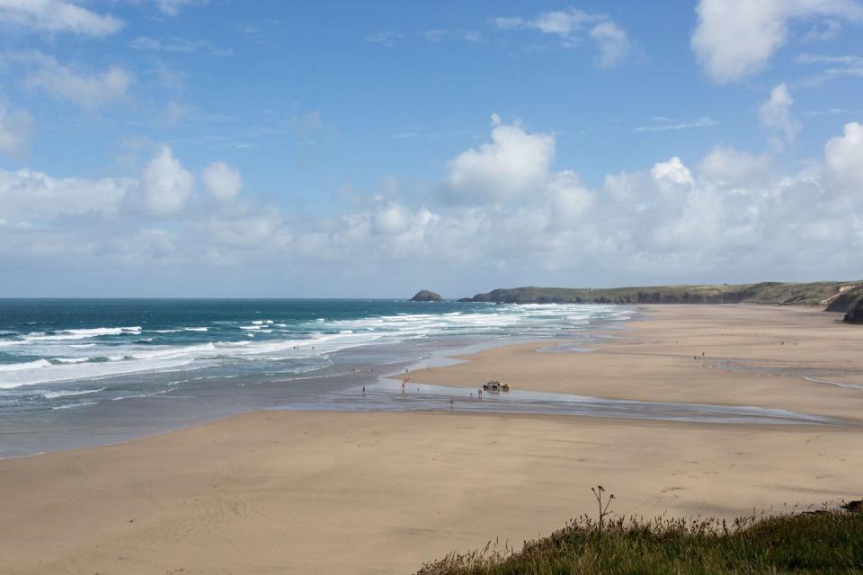 <p>This sprawling beach is long and flat, and backed by beautiful sand dunes. Plus their are rock pools for playing, and surfing and paddle boarding if you're feeling sporty.<br></p><p><a class="link " href="https://www.booking.com/" rel="nofollow noopener" target="_blank" data-ylk="slk:FIND ACCOMMODATION;elm:context_link;itc:0;sec:content-canvas">FIND ACCOMMODATION </a></p>