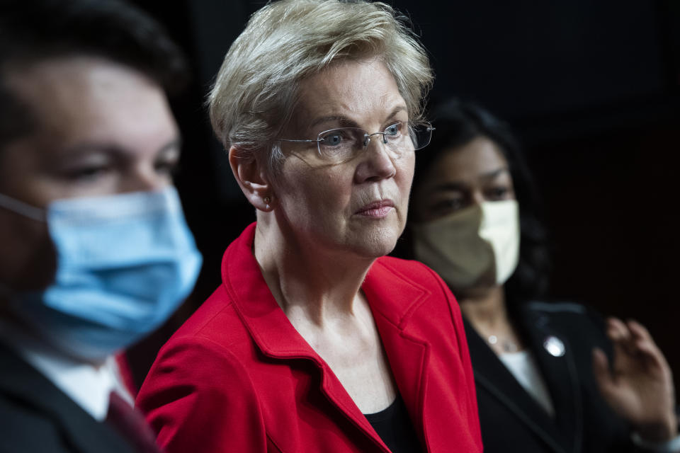 UNITED STATES - MARCH 01: From left, Rep. Brendan Boyle, D-Pa., Sen. Elizabeth Warren, D-Mass., and Rep. Pramila Jayapal, D-Wash., conduct a news conference in the Capitol to introduce the Ultra-Millionaire Tax Act which would tax high net worth households on Monday, March 1, 2021. (Photo By Tom Williams/CQ-Roll Call, Inc via Getty Images)